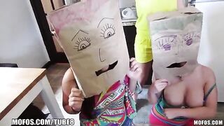 The girls wear sex bags on their heads and have sex