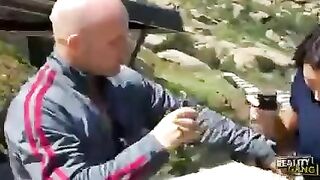A guy fucked a pretty girl with dark hair in the woods