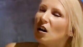 A beautiful woman is tied up and fucked by two men