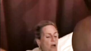 A big black guy is fucking a mature woman hard