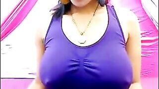 Braless and excited, her nipples stand out through her T-shirt