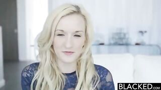 A blondie is playing with a vibrator while getting fucked by BBC