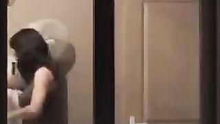 A hot guy admires his naked body in the mirror