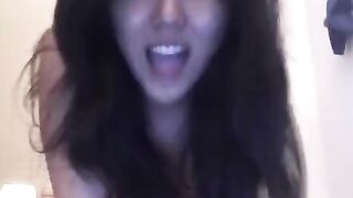 The Asian beauty knows how to amuse herself without any help