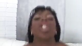 Black woman sucks the dick of a white man in this hot video