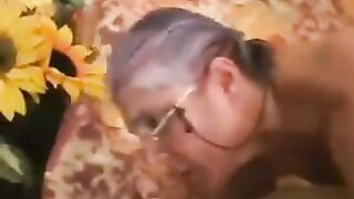 A mature woman in gray stockings was fucked by a man, showcasing intense passion