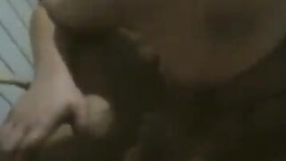A BBW is dancing naked in front of her husband, showcasing her curves