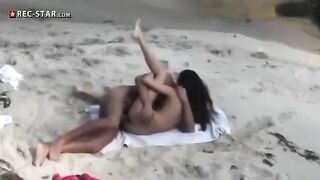 A couple has real sex on the beach with no one around