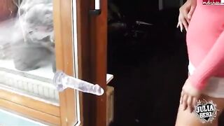 A sexy girl plays with her huge boobs and a toy dump truck