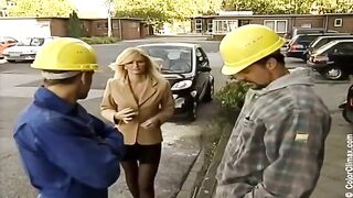 The girl in black pantyhose makes a blowjob directly on the set