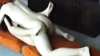 A married couple has sex at their home, showcasing passionate homemade intimacy
