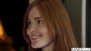 The guy carefully licked the cap of a red-haired woman