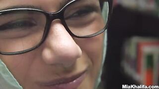 Busty Arab pornstar Mia Khalifa masturbates in the library solo scene