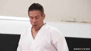 A girl is having fun with her coach in an unusual pose