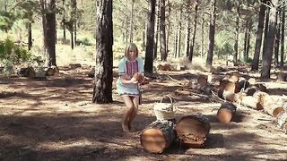 A couple engages in passionate outdoor sex right in the woods, risking getting caught