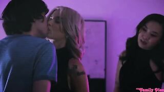 An Asian girl has sex with her European boyfriend on the couch