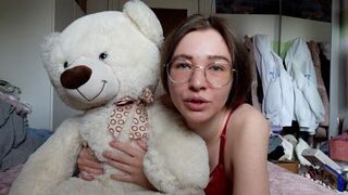 A cute girl has her teddy bear as her best friend and confidant