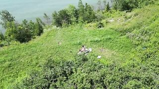 Instead of a picnic, they enjoyed outdoor intimacy in the field