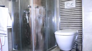 A pretty woman has sex with her boyfriend in the shower