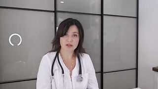 A girl with big balls of happiness was examined by a doctor