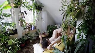 A couple has a gentle and passionate encounter on the couch at home